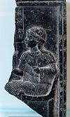 Fragmentary Neo-Sumerian steatite relief showing Ninsun